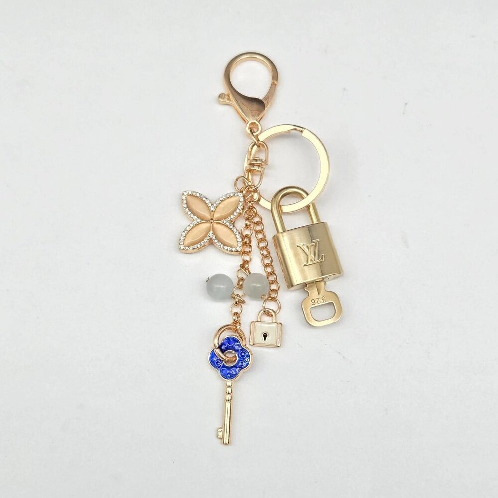 Authentic Louis Vuitton Lock & Key with unbranded Flower Bagcharm, Keycharm